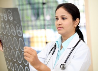 “Concussion” Depicts Struggles of a Pathologist Against NFL